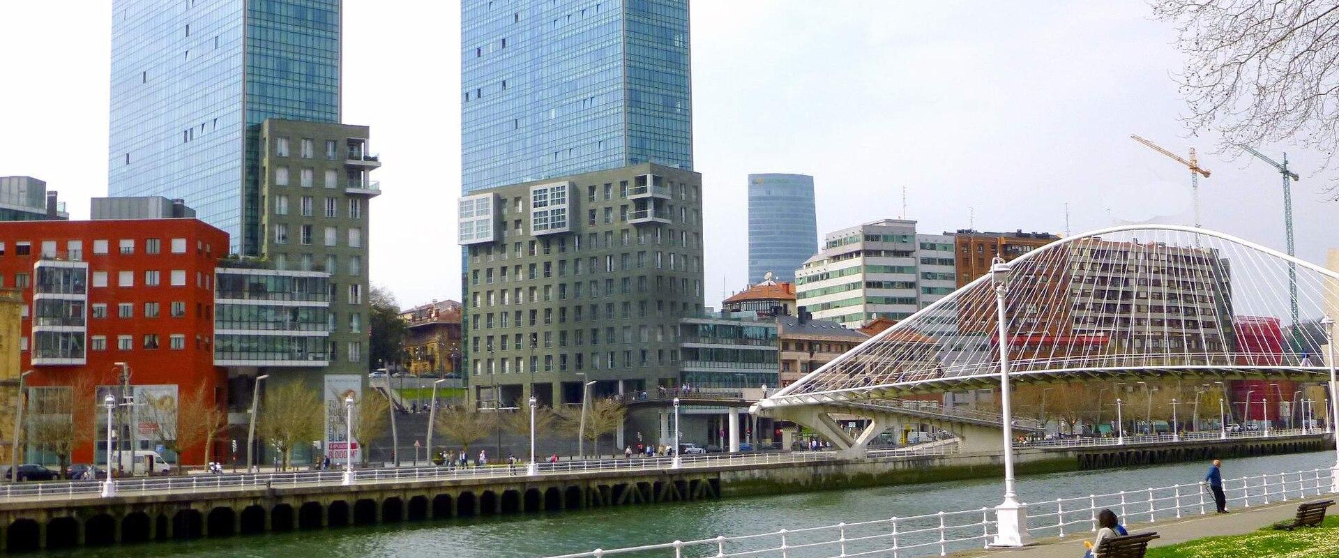 Riverside promenade at Abandoibarra in Bilbao with the Iberdrola Tower