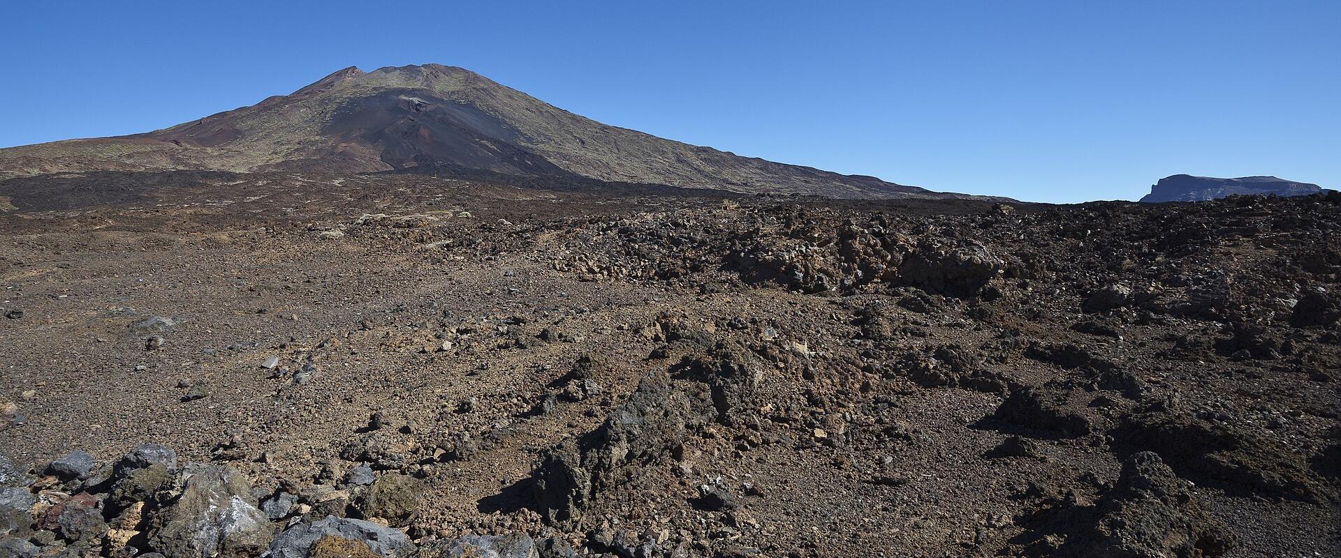 Mount Teide rising above the volcanic plain of Las Cañadas in Teide National Park, Tenerife