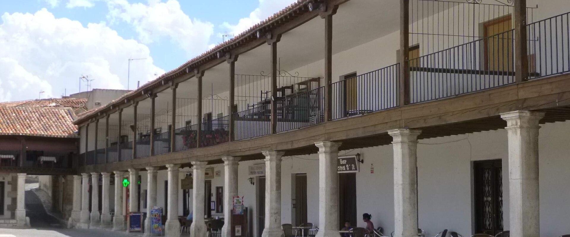 The arcaded Plaza Mayor of Colmenar de Oreja with wooden balconies