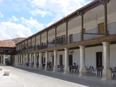 The arcaded Plaza Mayor of Colmenar de Oreja with wooden balconies
