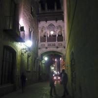 The neo-Gothic bridge over Carrer del Bisbe in Barcelona's Gothic Quarter at night