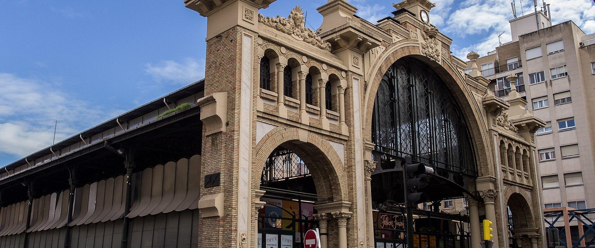 The iron-and-stone facade of the Mercado Central in Zaragoza