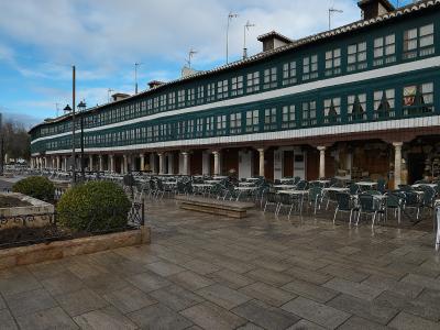 Almagro's Plaza Mayor with its long green-framed glazed galleries