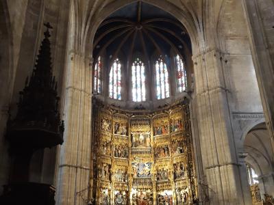 The Gothic nave of Oviedo Cathedral leading to its gilded main altarpiece