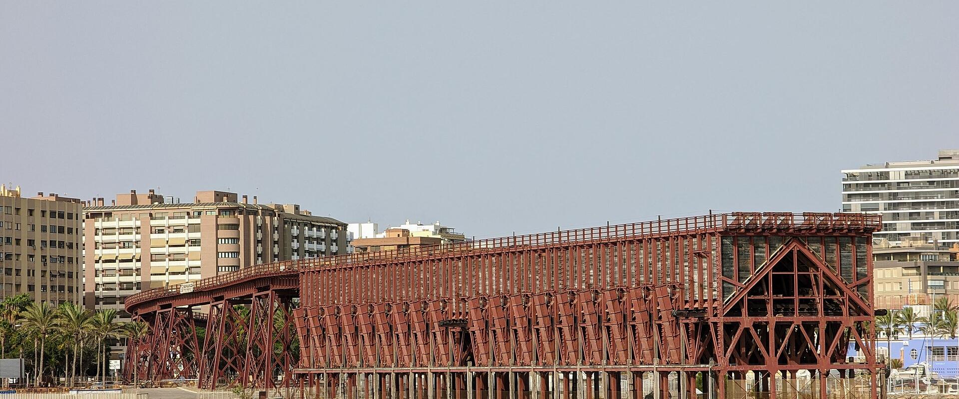 The long red iron Cable Inglés ore-loading pier on the Almería waterfront