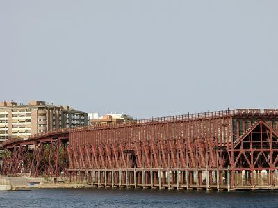 The long red iron Cable Inglés ore-loading pier on the Almería waterfront
