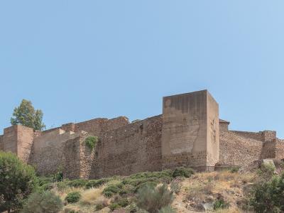 The walls of the Alcazaba of Málaga on its hillside