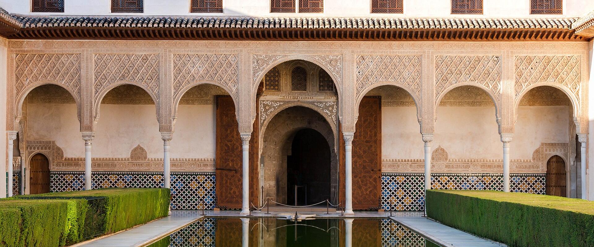 The Court of the Myrtles (Patio de los Arrayanes) and its reflecting pool in the Alhambra, Granada